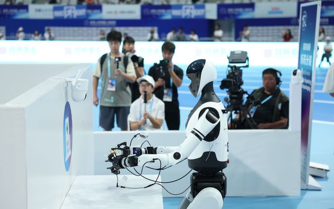 机器人比什么？能应用到现实生活中吗？直击世界人形机器人运动会(图2)