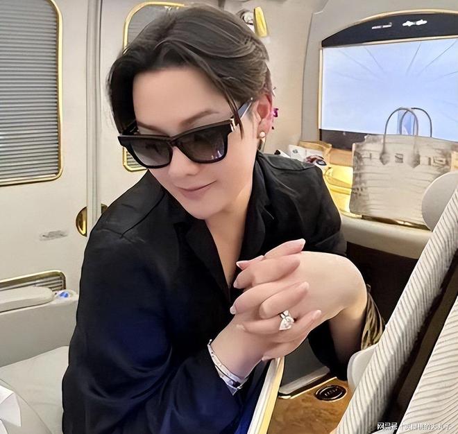 人民日报怒批炫富偷税749万跑国外现又割内地韭菜(图16)